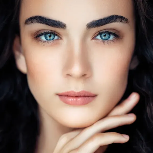 Woman with radiant, youthful skin showcasing the effects of DIBI Milano Bio Exosome facial at The Vintage Avenue Skin Clinic