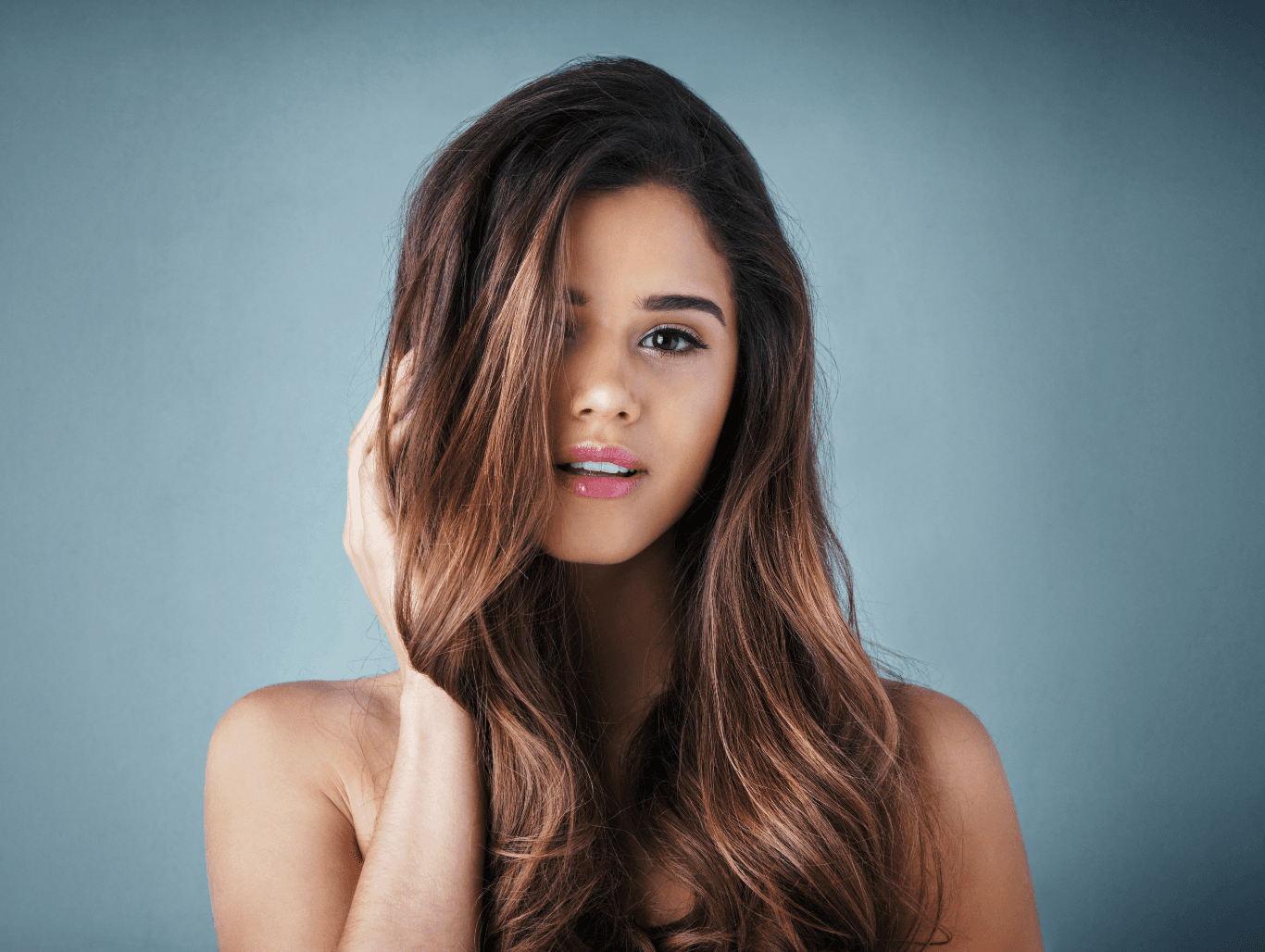Model with long, soft brown balayage hair styled in loose waves, showcasing a natural sun-kissed finish – Full Head Balayage by The Vintage Avenue, Biggleswade