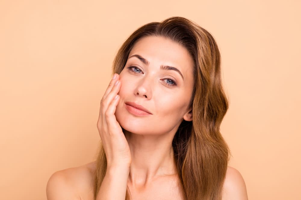 Woman with smooth, youthful skin after polynucleotide jowl treatment in Biggleswade